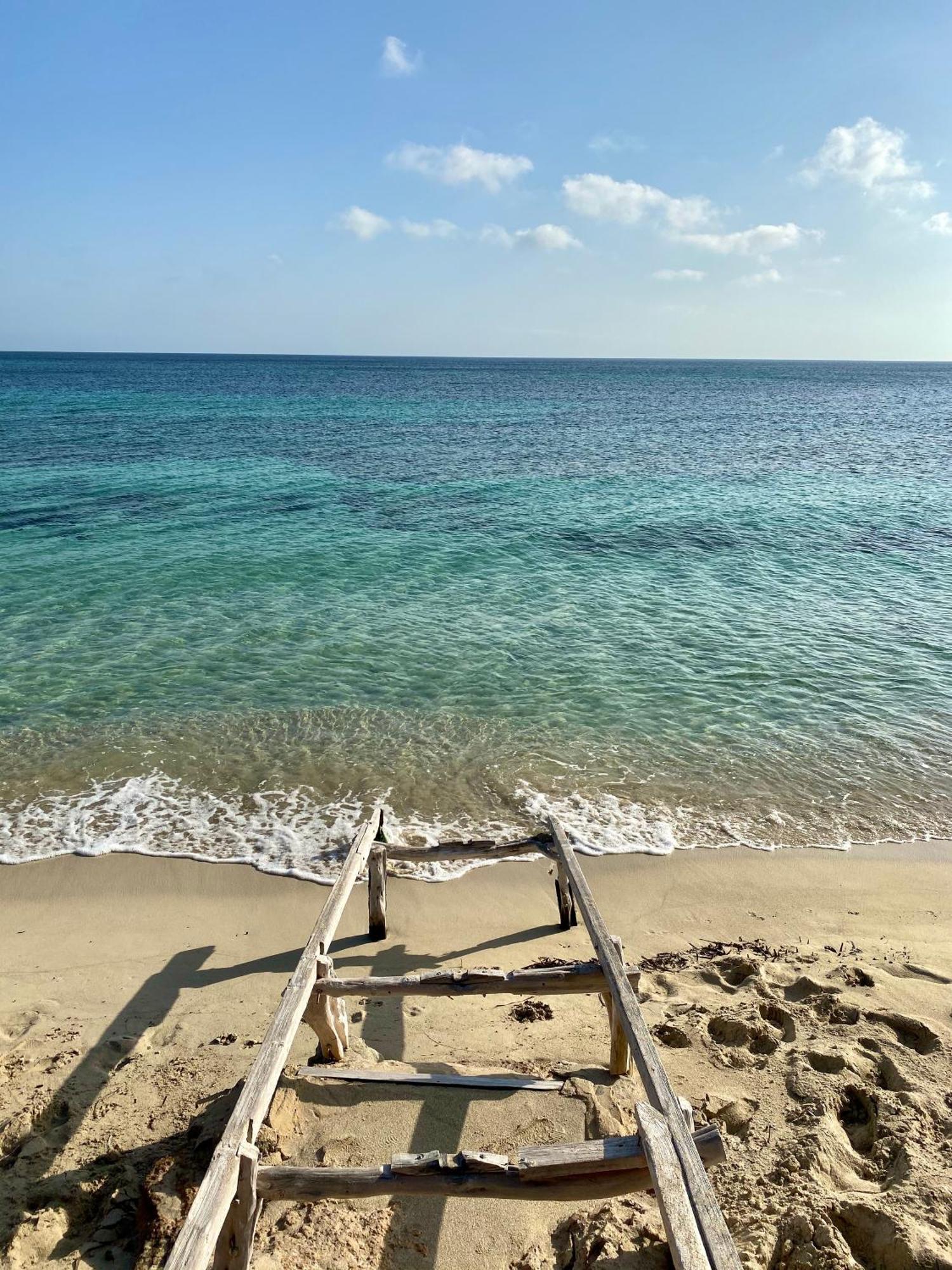 Apartamentos Laura Playa De Migjorn المظهر الخارجي الصورة